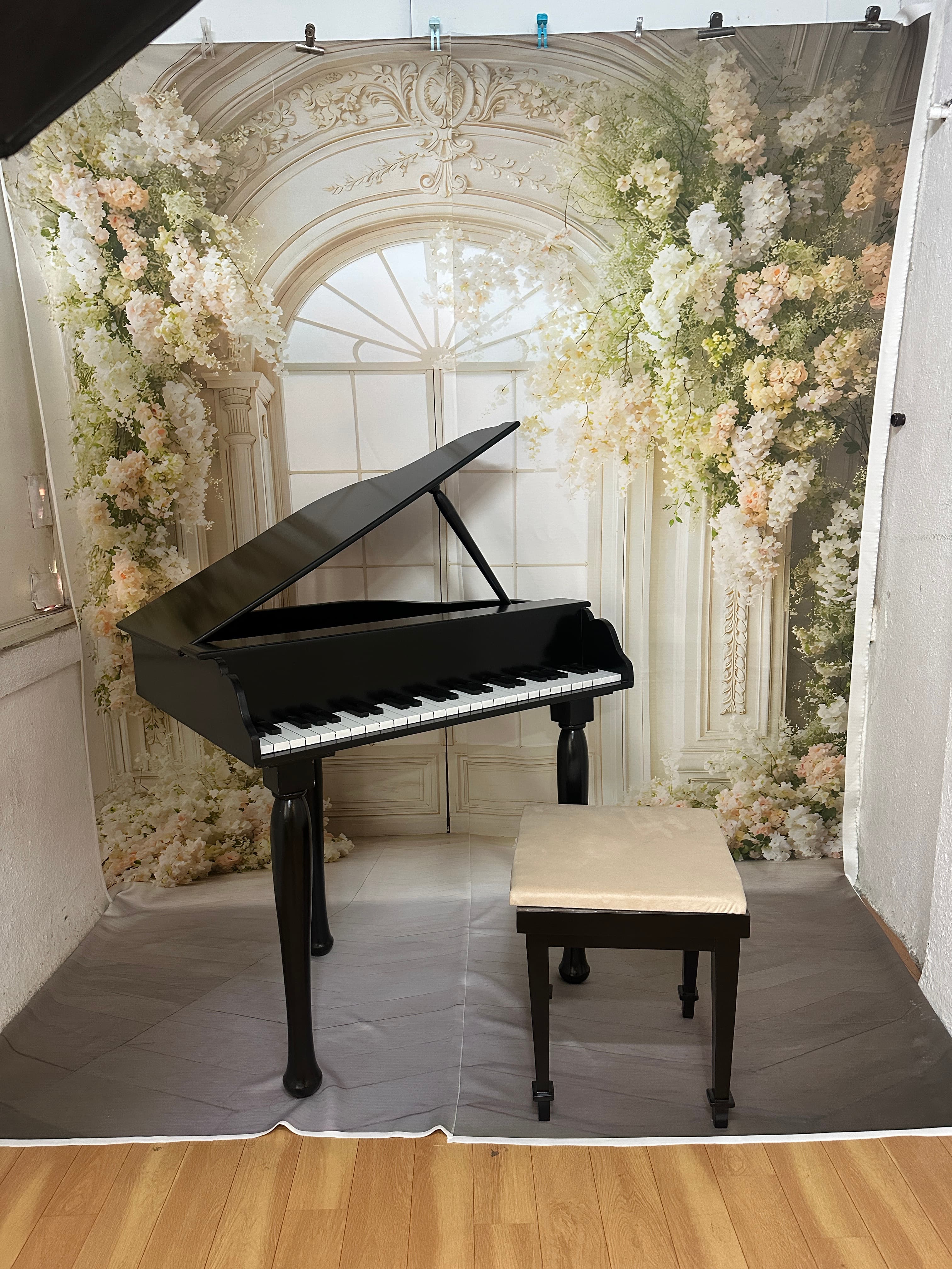 Baby photoshoot piano set with floral arch inside IBS studio in Pune