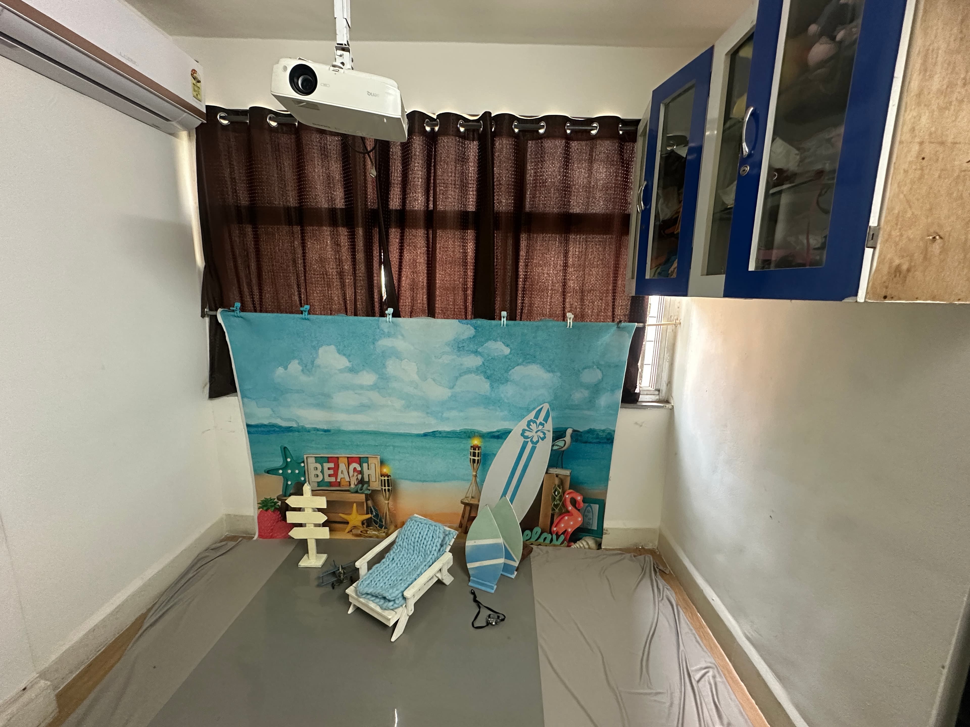 Beach themed baby photoshoot backdrop corner inside the IBS studio
